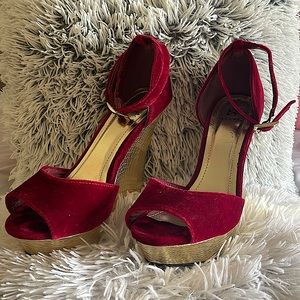 A pair of Scene red and gold platform heels size 9.5 only worn 2 times.